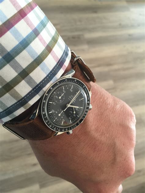 omega speedmaster gold and leather|omega speedmaster reduced nato strap.